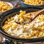 Slow Cooker Mac and Cheese is an incredibly easy crockpot recipe that's perfect for any occasion! This dish is nearly foolproof and consistently turns out creamy and extra cheesy. It truly is one of the best comfort foods around the world!